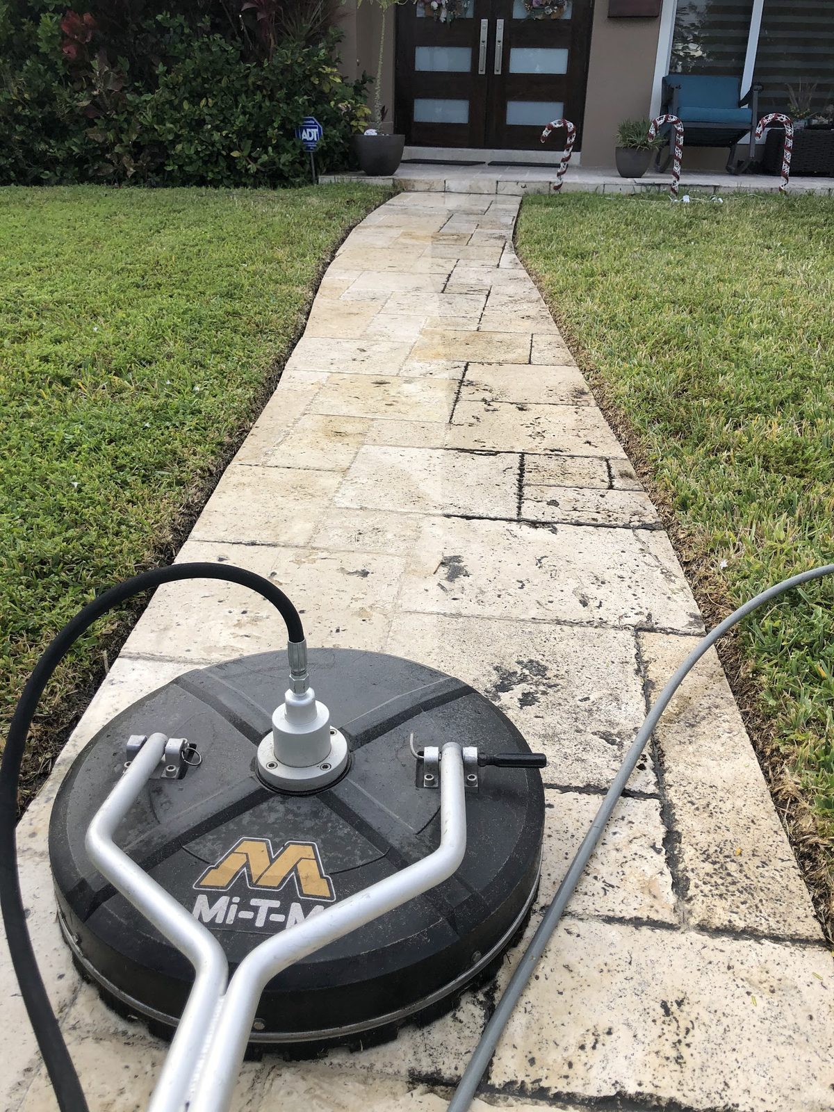 Travertine pool surround, surface-cleaned